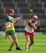 13 April 2025; Caoimhe O'Donovan of Offaly in action against Orlaith Hull of Derry during the Very National Camogie League Division 2A final match between between Derry and Offaly at FBD Semple Stadium in Thurles, Tipperary. Photo by Tom Beary/Sportsfile