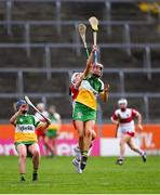 13 April 2025; Caoimhe O'Donovan of Offaly in action against Rebecca Bradley of Derry during the Very National Camogie League Division 2A final match between between Derry and Offaly at FBD Semple Stadium in Thurles, Tipperary. Photo by Tom Beary/Sportsfile