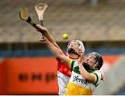 13 April 2025; Mairead Teehan of Offaly in action against Roisin Cassidy of Derry during the Very National Camogie League Division 2A final match between between Derry and Offaly at FBD Semple Stadium in Thurles, Tipperary. Photo by Tom Beary/Sportsfile