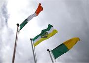 13 April 2025; Flags are flying in the wind, from left, the Irish tricolour, Offaly GAA, and Meath GAA flag before the Leinster GAA Football Senior Championship quarter-final match between Meath and Offaly at Pairc Tailteann in Navan, Meath. Photo by Thomas Flinkow/Sportsfile