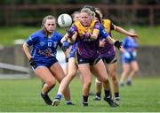 13 April 2025; Katie English of Wexford is tackled by Ellie Brady of Cavan during the Lidl Ladies National Football League Division 3 final match between Cavan and Wexford at Integral GAA Grounds in Drogheda, Louth. Photo by Shauna Clinton/Sportsfile