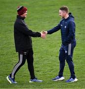13 April 2025; Louth manager Ger Brennan, left, and Laois selector Ross Munnelly shake hands before the Leinster GAA Football Senior Championship quarter-final match between Louth and Laois at Cedral St Conleth's Park in Newbridge, KiIdare. Photo by Piaras Ó Mídheach/Sportsfile
