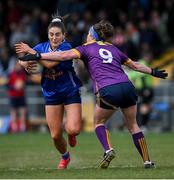 13 April 2025; Shauna Lynch of Cavan is tackled by Róisín Murphy of Wexford during the Lidl Ladies National Football League Division 3 final match between Cavan and Wexford at Integral GAA Grounds in Drogheda, Louth. Photo by Shauna Clinton/Sportsfile