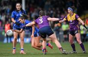 13 April 2025; Shauna Lynch of Cavan is tackled by Maria Byrne of Wexford during the Lidl Ladies National Football League Division 3 final match between Cavan and Wexford at Integral GAA Grounds in Drogheda, Louth. Photo by Shauna Clinton/Sportsfile