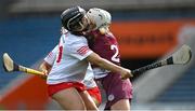 13 April 2025; Shauna Healy of Galway is tackled by Amy O’Connor of Cork during the Very National Camogie League Division 1A final match between between Cork and Galway at FBD Semple Stadium in Thurles, Tipperary. Photo by Tom Beary/Sportsfile