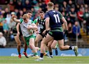 13 April 2025; Cormac Egan of Offaly in action against Ciarán Caulfield of Meath during the Leinster GAA Football Senior Championship quarter-final match between Meath and Offaly at Pairc Tailteann in Navan, Meath. Photo by Thomas Flinkow/Sportsfile
