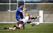 13 April 2025; Lauren McVeety of Cavan scores her side's first goal despite the efforts of Wexford goalkeeper Siobhan Cloake during the Lidl Ladies National Football League Division 3 final match between Cavan and Wexford at Integral GAA Grounds in Drogheda, Louth. Photo by Shauna Clinton/Sportsfile