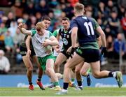 13 April 2025; Cormac Egan of Offaly in action against Ciarán Caulfield of Meath during the Leinster GAA Football Senior Championship quarter-final match between Meath and Offaly at Pairc Tailteann in Navan, Meath. Photo by Thomas Flinkow/Sportsfile