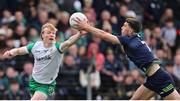 13 April 2025; Cormac Egan of Offaly in action against Ciarán Caulfield of Meath during the Leinster GAA Football Senior Championship quarter-final match between Meath and Offaly at Pairc Tailteann in Navan, Meath. Photo by Thomas Flinkow/Sportsfile
