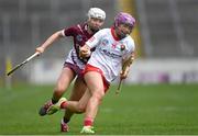 13 April 2025; Orlaith Cahalane of Cork is tackled by Rachael Hanniffy of Galway during the Very National Camogie League Division 1A final match between between Cork and Galway at FBD Semple Stadium in Thurles, Tipperary. Photo by Tom Beary/Sportsfile