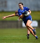 13 April 2025; Catherine Dolan of Cavan is tackled by Sherene Hamilton of Wexford during the Lidl Ladies National Football League Division 3 final match between Cavan and Wexford at Integral GAA Grounds in Drogheda, Louth. Photo by Shauna Clinton/Sportsfile