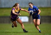 13 April 2025; Catherine Dolan of Cavan is tackled by Sherene Hamilton of Wexford during the Lidl Ladies National Football League Division 3 final match between Cavan and Wexford at Integral GAA Grounds in Drogheda, Louth. Photo by Shauna Clinton/Sportsfile