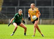 13 April 2025; Theresa Mellon of Antrim in action against Cadhla Cara Bogue of Fermanagh during the Lidl Ladies National Football League Division 4 final match between Antrim and Fermanagh at St Tiernach's Park in Clones, Monaghan. Photo by Matt Browne/Sportsfile