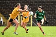 13 April 2025; Joanne Doonan of Fermanagh in action against  Ciara Brown of Antrim during the Lidl Ladies National Football League Division 4 final match between Antrim and Fermanagh at St Tiernach's Park in Clones, Monaghan. Photo by Matt Browne/Sportsfile