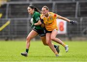 13 April 2025; Cadhla Cara Bogue of Fermanagh in action against Ciara Brown of Antrim during the Lidl Ladies National Football League Division 4 final match between Antrim and Fermanagh at St Tiernach's Park in Clones, Monaghan. Photo by Matt Browne/Sportsfile