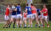13 April 2025; Damon Larkin of Laois in action against Andy Mc Donnell of Louth, left, during the Leinster GAA Football Senior Championship quarter-final match between Louth and Laois at Cedral St Conleth's Park in Newbridge, KiIdare. Photo by Piaras Ó Mídheach/Sportsfile