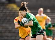 13 April 2025; Eimear Smyth of Fermanagh in action against  Niamh McIntosh of Antrim during the Lidl Ladies National Football League Division 4 final match between Antrim and Fermanagh at St Tiernach's Park in Clones, Monaghan. Photo by Matt Browne/Sportsfile