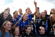 13 April 2025; Cavan players, including Catherine Dolan, centre, celebrate with supporters after their side's victory in the Lidl Ladies National Football League Division 3 final match between Cavan and Wexford at Integral GAA Grounds in Drogheda, Louth. Photo by Shauna Clinton/Sportsfile