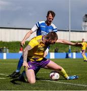 13 April 2025; Gary Delaney of Wexford Football League in action against Vincent Ryan of Limerick District League during the FAI Oscar Traynor Inter-League Cup final match between Limerick District League and Wexford Football League at Jackman Park in Limerick. Photo by Michael P Ryan/Sportsfile