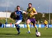 13 April 2025; Gary Delaney of Wexford Football League in action against Vincent Ryan of Limerick District League during the FAI Oscar Traynor Inter-League Cup final match between Limerick District League and Wexford Football League at Jackman Park in Limerick. Photo by Michael P Ryan/Sportsfile