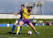 13 April 2025; Gary Delaney of Wexford Football League in action against Vincent Ryan of Limerick District League during the FAI Oscar Traynor Inter-League Cup final match between Limerick District League and Wexford Football League at Jackman Park in Limerick. Photo by Michael P Ryan/Sportsfile