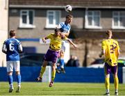 13 April 2025; Reece Murphy of Wexford Football League in action against Eliah Riordan of Limerick District League during the FAI Oscar Traynor Inter-League Cup final match between Limerick District League and Wexford Football League at Jackman Park in Limerick. Photo by Michael P Ryan/Sportsfile