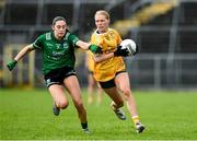 13 April 2025; Theresa Mellon of Antrim in action against Cadhla Cara Bogue of Fermanagh during the Lidl Ladies National Football League Division 4 final match between Antrim and Fermanagh at St Tiernach's Park in Clones, Monaghan. Photo by Matt Browne/Sportsfile