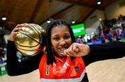 13 April 2025; Destiny Strother of Killester celebrates with the MVP Ball and her winners medal after the Domino's Women's Super League final match between Utility Trust St. Paul's and Killester at the National Basketball Arena in Tallaght, Dublin. Photo by Tyler Miller/Sportsfile