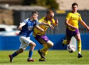 13 April 2025; Leon Daly of Limerick District League in action against Paul Brennan of Wexford Football League during the FAI Oscar Traynor Inter-League Cup final match between Limerick District League and Wexford Football League at Jackman Park in Limerick. Photo by Michael P Ryan/Sportsfile