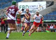 13 April 2025; Ciara Hickey of Galway in action against Kate Wall of Cork during the Very National Camogie League Division 1A final match between between Cork and Galway at FBD Semple Stadium in Thurles, Tipperary. Photo by Tom Beary/Sportsfile