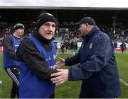 13 April 2025; Offaly joint-manager Mickey Harte with Meath manager Robbie Brennan after the Leinster GAA Football Senior Championship quarter-final match between Meath and Offaly at Pairc Tailteann in Navan, Meath. Photo by Thomas Flinkow/Sportsfile