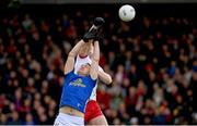 13 April 2025; Killian Clarke of Cavan and Brian Kennedy of Tyrone during the Ulster GAA Football Senior Championship quarter-final match between Tyrone and Cavan at O'Neills Healy Park in Omagh, Tyrone. Photo by Ramsey Cardy/Sportsfile