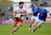 13 April 2025; Darren McCurry of Tyrone in action against Cian Reilly of Cavan during the Ulster GAA Football Senior Championship quarter-final match between Tyrone and Cavan at O'Neills Healy Park in Omagh, Tyrone. Photo by Ramsey Cardy/Sportsfile