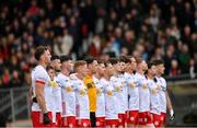 13 April 2025; The Tyrone team during the playing of the National Anthem before the Ulster GAA Football Senior Championship quarter-final match between Tyrone and Cavan at O'Neills Healy Park in Omagh, Tyrone. Photo by Ramsey Cardy/Sportsfile
