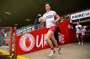 13 April 2025; Brian Kennedy leads the Tyrone team out before the Ulster GAA Football Senior Championship quarter-final match between Tyrone and Cavan at O'Neills Healy Park in Omagh, Tyrone. Photo by Ramsey Cardy/Sportsfile