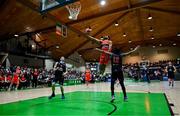 13 April 2025; Kason Harrell of Killester shoots despite the efforts of Patrick Robinson of UCC Demons during the Domino's Men's Super League final match between UCC Demons and Killester at the National Basketball Arena in Tallaght, Dublin. Photo by Tyler Miller/Sportsfile