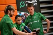 13 April 2025; Paralympics Ireland hosted their first Allianz NextGen event of 2025 at the University of Limerick Sport Arena. The event was open to young athletes over the age of 14 to try out Para sports such as triathlon, cycling, canoeing, archery and mountain climbing. Pictured is participant Shane Murphy from Kilmallock, Limerick, with Darragh Whelan of Cycling Ireland, left, and aspiring Paralympian Cormac O’Callaghan. Photo by Seb Daly/Sportsfile