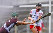 13 April 2025; Ashling Thompson of Cork is tackled by Mairead Dillion of Galway during the Very National Camogie League Division 1A final match between between Cork and Galway at FBD Semple Stadium in Thurles, Tipperary. Photo by Tom Beary/Sportsfile