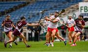 13 April 2025; Ashling Thompson of Cork in action against Carrie Dolan of Galway during the Very National Camogie League Division 1A final match between between Cork and Galway at FBD Semple Stadium in Thurles, Tipperary. Photo by Tom Beary/Sportsfile