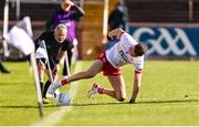 13 April 2025; Conn Kilpatrick of Tyrone keeps the ball in-play during the Ulster GAA Football Senior Championship quarter-final match between Tyrone and Cavan at O'Neills Healy Park in Omagh, Tyrone. Photo by Ramsey Cardy/Sportsfile