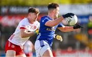 13 April 2025; Gerard Smith of Cavan in action against Aidan Clarke of Tyrone during the Ulster GAA Football Senior Championship quarter-final match between Tyrone and Cavan at O'Neills Healy Park in Omagh, Tyrone. Photo by Ramsey Cardy/Sportsfile