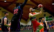 13 April 2025; Paul Dick of Killester in action against Elijah Tillman of UCC Demons during the Domino's Men's Super League final match between UCC Demons and Killester at the National Basketball Arena in Tallaght, Dublin. Photo by Tyler Miller/Sportsfile