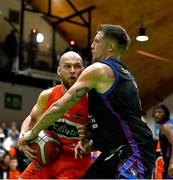 13 April 2025; Paul Dick of Killester in action against Tobias Christensen of UCC Demons during the Domino's Men's Super League final match between UCC Demons and Killester at the National Basketball Arena in Tallaght, Dublin. Photo by Tyler Miller/Sportsfile