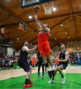 13 April 2025; Baptiste Chavelas of Killester in action against David Lehane, left, and James Hannigan of UCC Demons during the Domino's Men's Super League final match between UCC Demons and Killester at the National Basketball Arena in Tallaght, Dublin. Photo by Tyler Miller/Sportsfile