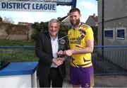 13 April 2025; FAI President Paul Cooke presents the player of the match award to Gary Delaney of Wexford Football League during the FAI Oscar Traynor Inter-League Cup final match between Limerick District League and Wexford Football League at Jackman Park in Limerick. Photo by Michael P Ryan/Sportsfile