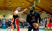 13 April 2025; Elijah Tillman of UCC Demons in action against Baptiste Chavelas of Killester during the Domino's Men's Super League final match between UCC Demons and Killester at the National Basketball Arena in Tallaght, Dublin. Photo by Tyler Miller/Sportsfile