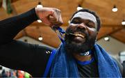 13 April 2025; Elijah Tillman of UCC Demons celebrates with his winners medal after the Domino's Men's Super League final match between UCC Demons and Killester at the National Basketball Arena in Tallaght, Dublin. Photo by Tyler Miller/Sportsfile