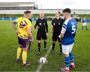 13 April 2025; Referee Ray Conlon performs the coin toss with Wexford Football League captain Alan Rhodes, left and Limerick District League captain Adam Lipper during the FAI Oscar Traynor Inter-League Cup final match between Limerick District League and Wexford Football League at Jackman Park in Limerick. Photo by Michael P Ryan/Sportsfile