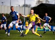 13 April 2025; Paul Brennan of Wexford Football League in action against Tom Frawley of Limerick District League during the FAI Oscar Traynor Inter-League Cup final match between Limerick District League and Wexford Football League at Jackman Park in Limerick. Photo by Michael P Ryan/Sportsfile