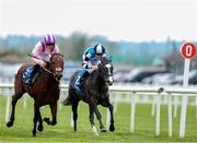 12 April 2025; Stop The Nation, left, with James Ryan up, on their way to winning the Irish Stallion Farms EBF Race at The Curragh Racecourse in Kildare. Photo by Thomas Doolin/Sportsfile